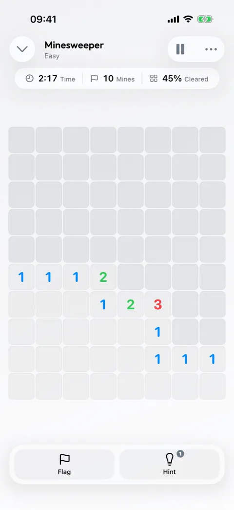 A Minesweeper field in Winters Puzzles, partly cleared, with numbers and flags